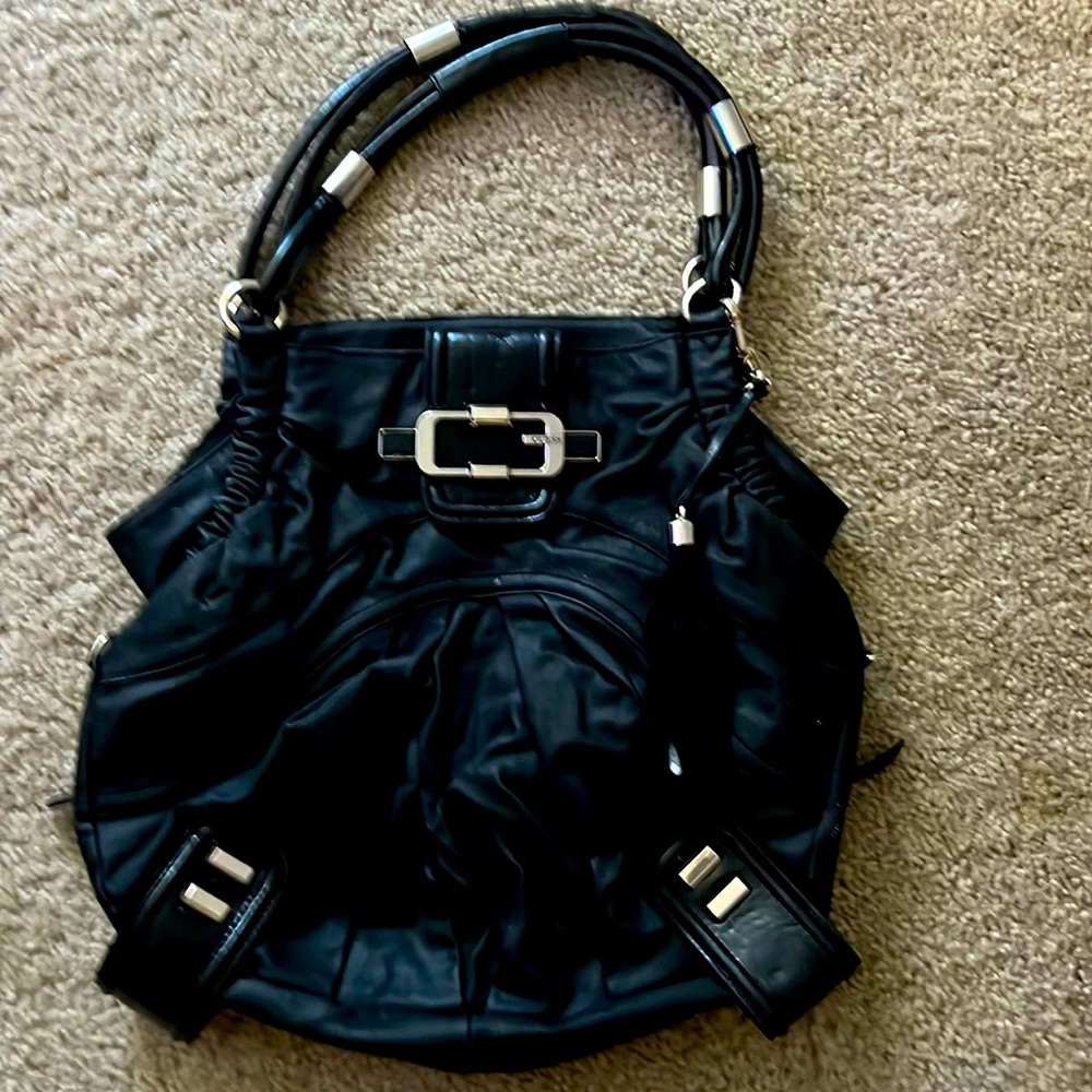 Original guess all black hobo bag. Gently worn with leopard print inside.